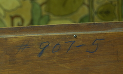 Hand written model number on the back of the mirror.